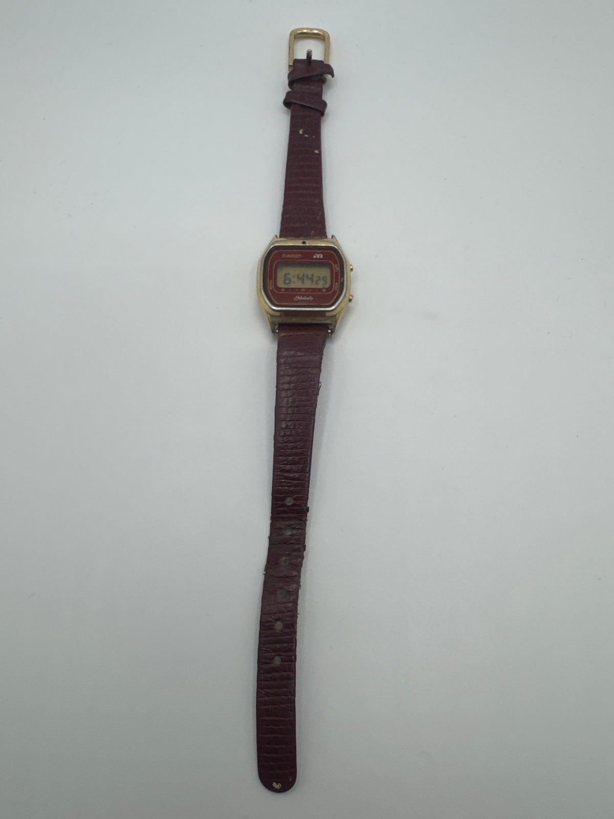 Casio Melody Vintage 1980s Digital Quartz Red Dial Gold Case red Leather Strap