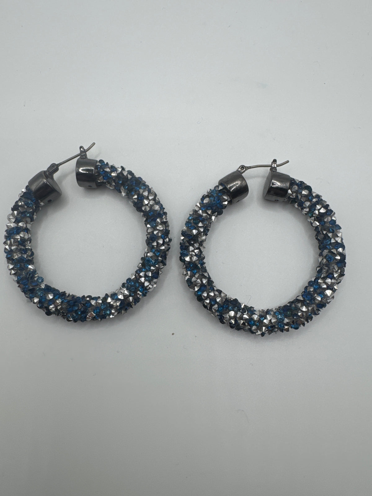 Silver-Toned Hoop Earrings Embedded with Sparkling Dark Blue and Iridescent Crystals