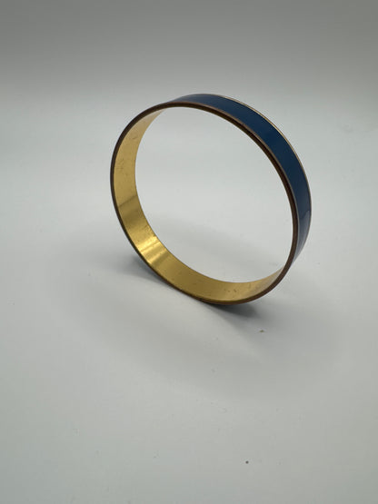 Glossy blue enamel wide bangle bracelet finished with gold-tone edges